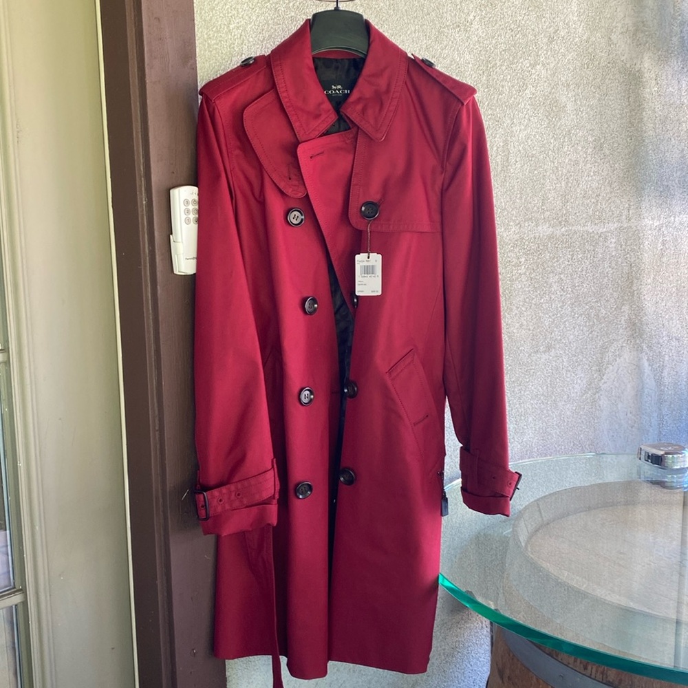 Coach brand Trench Coat. Color: Ruby